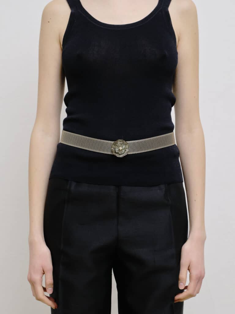 Mesh and mother-of-pearl belt.