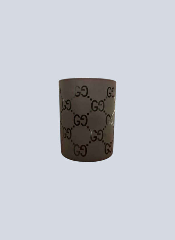 <b>Gucci</b> <br> candela cilindrica profumata.