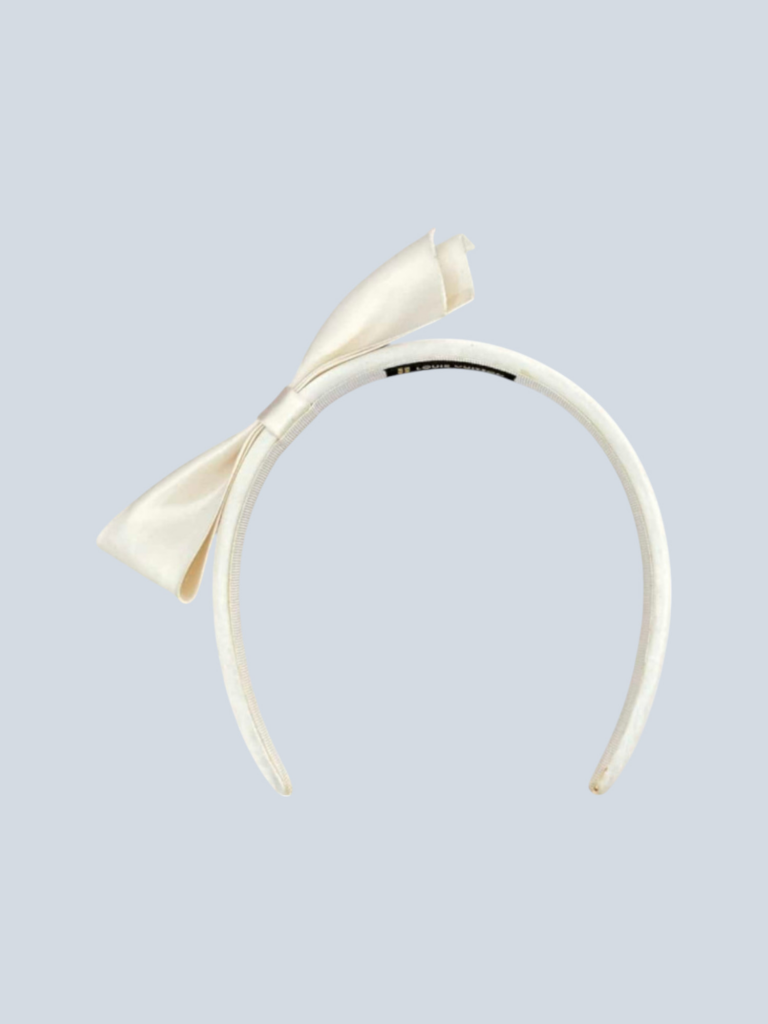 Satin headband with bow.