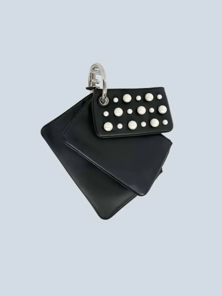 Borsa a mano Triplette in pelle e perle.