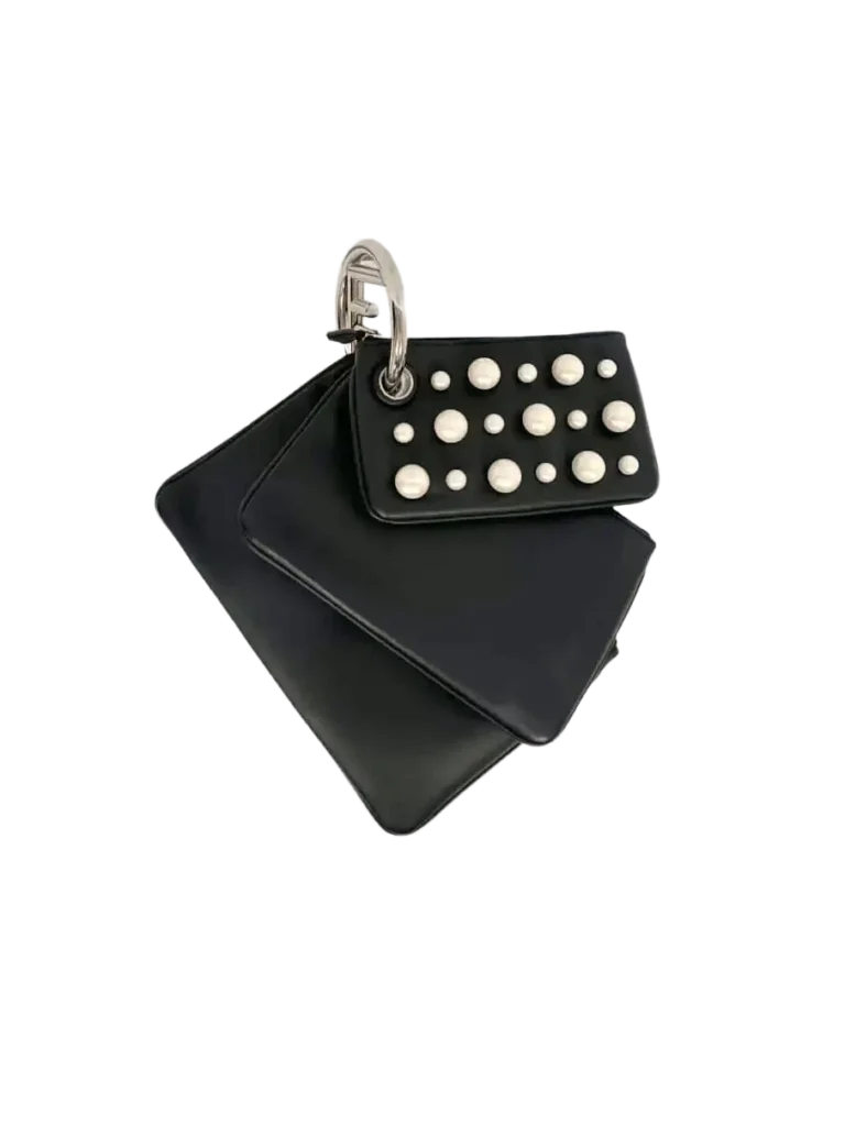 Borsa a mano Triplette in pelle e perle.
