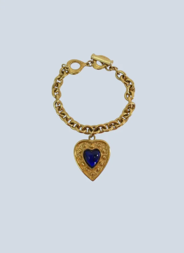 <b>Yves Saint Laurent</b><br> bracciale in metallo con ciondolo a cuore.