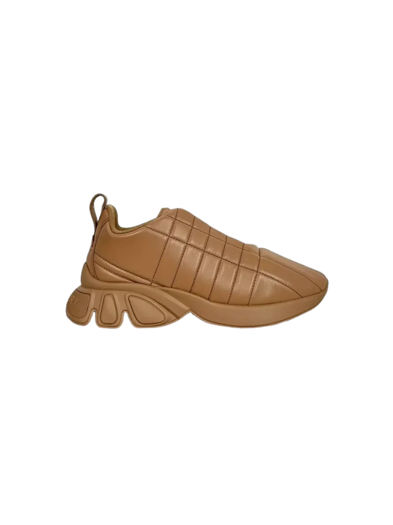 Sneakers trapuntate in pelle.