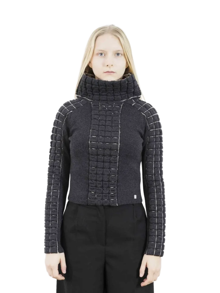 Maglione a collo alto in lana matelassé.