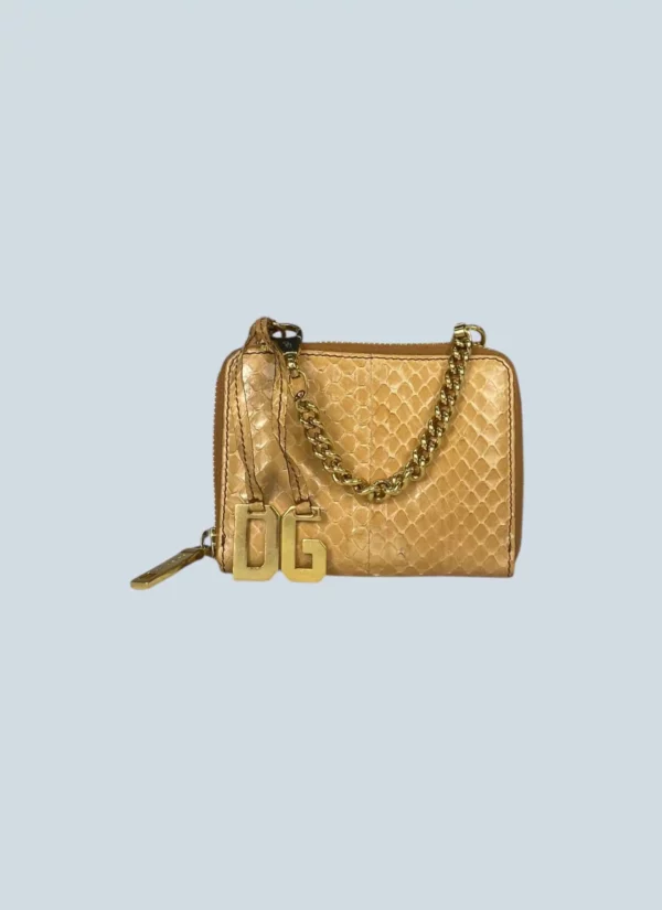<b>Dolce&Gabbana</b> <br> portafoglio in pitone con charms.