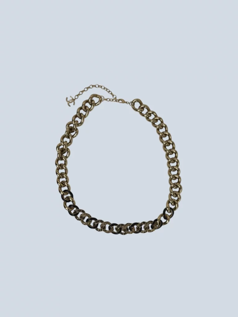 Metal and leather necklace.