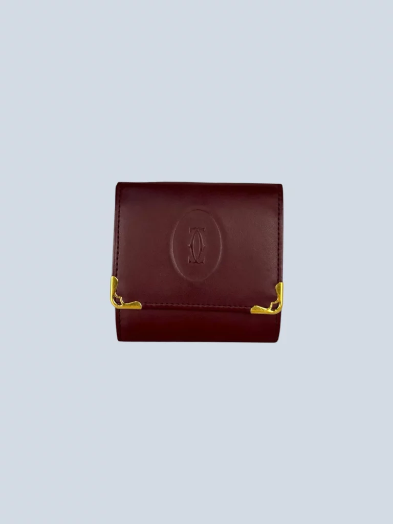Portamonete in pelle con logo impresso.
