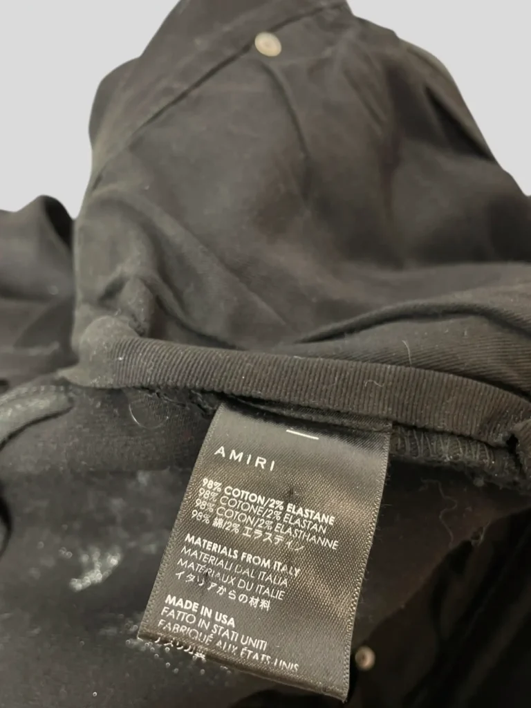Pantaloni skinny in cotone distressed e glitter., foto 9 di 9