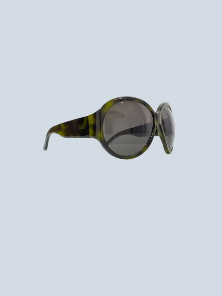Occhiali da sole rotondi in acetato con logo strass.