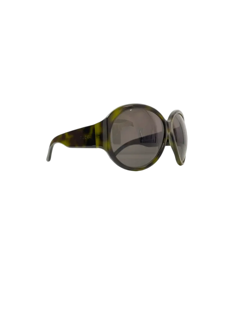 Round acetate sunglasses with rhinestone logo.