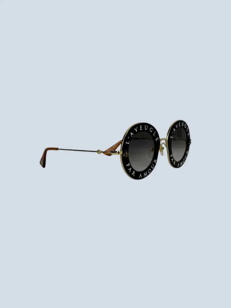 “L’aveugle par amour” metal sunglasses.
