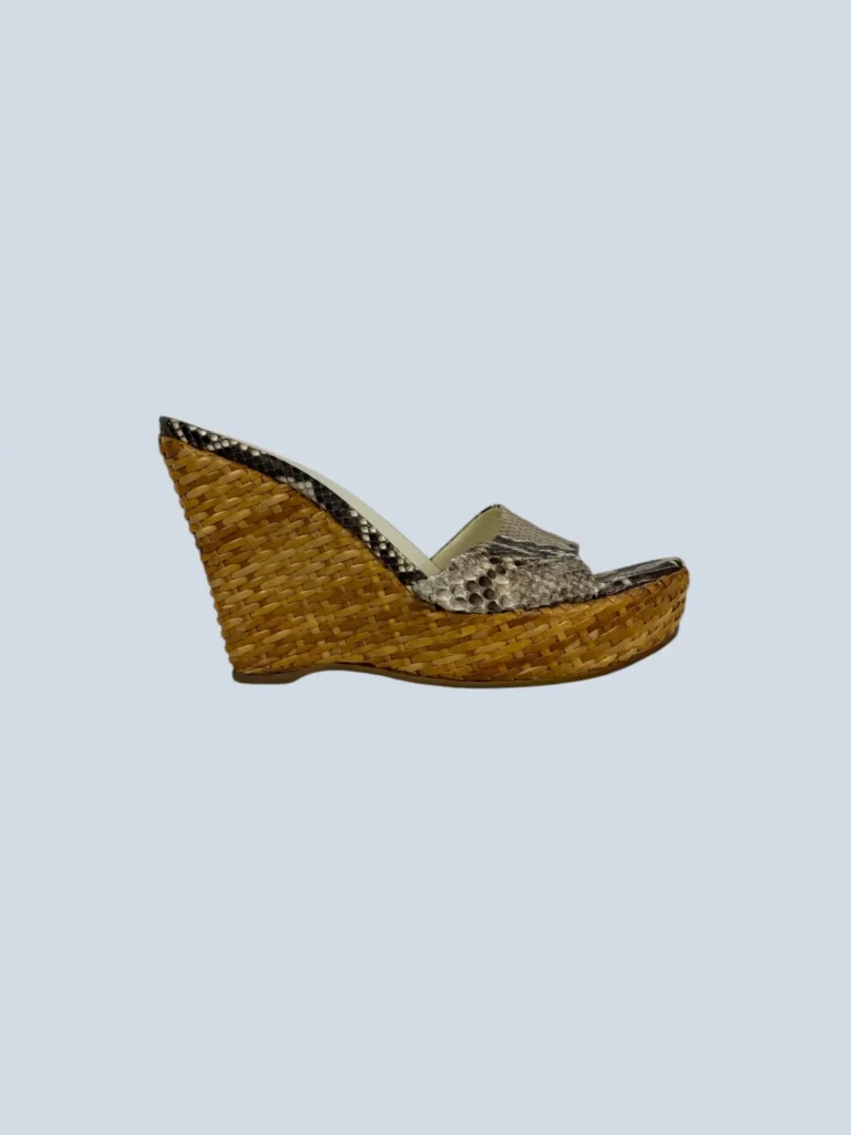 Mules con zeppa in vimini e pitone, 37.