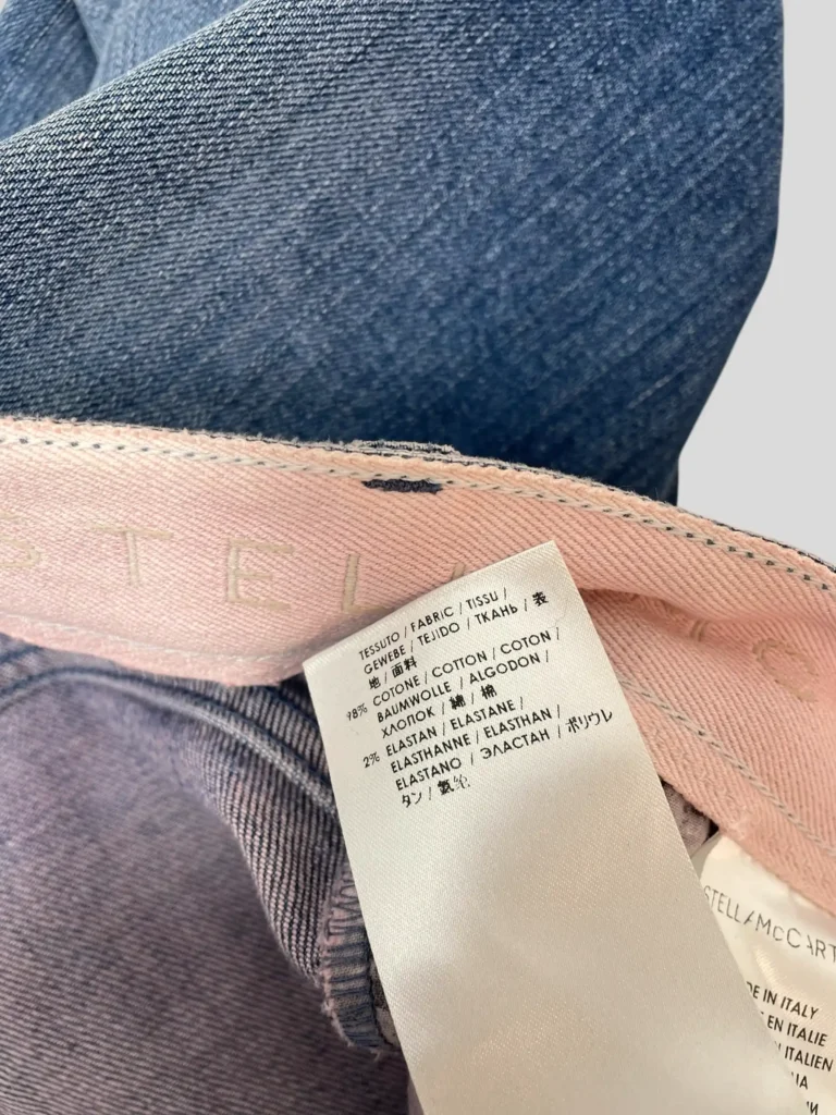 Pantaloni in denim distressed delavé, 26., foto 8 di 9