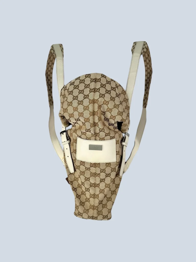 Baby carrier in tela Monogram e pelle.