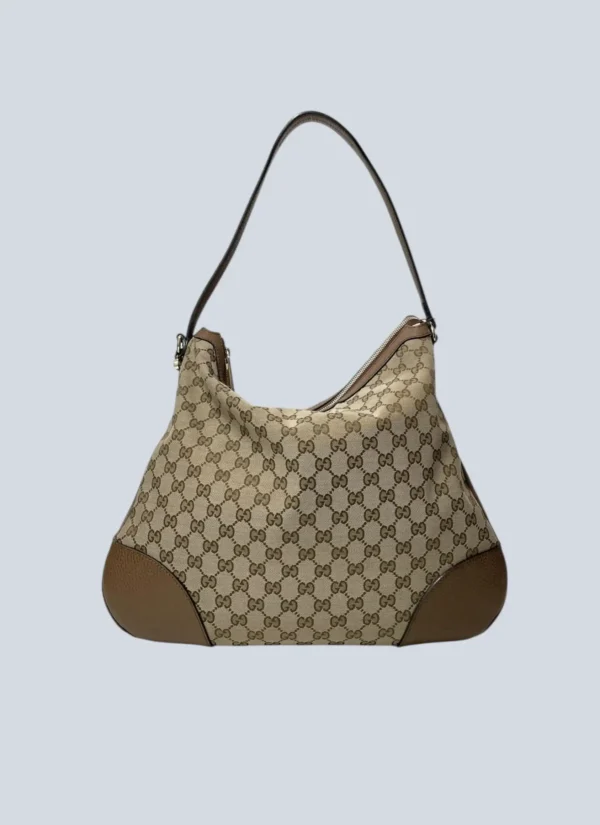 <b>Gucci</b><br> borsa a spalla Charlotte in tela Monogram e pelle.