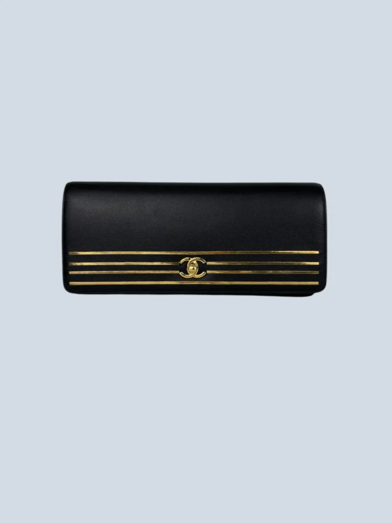 Pochette Captain Gold in pelle caviar..