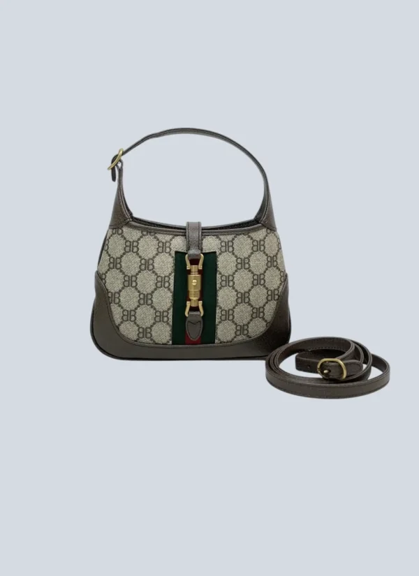 <b>Gucci x Balenciaga</b><br> borsa Jackie 1961 Mini in tela Monogram e pelle.