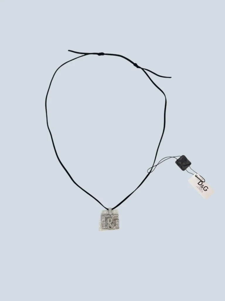 Leather necklace with DG rhinestone pendant.
