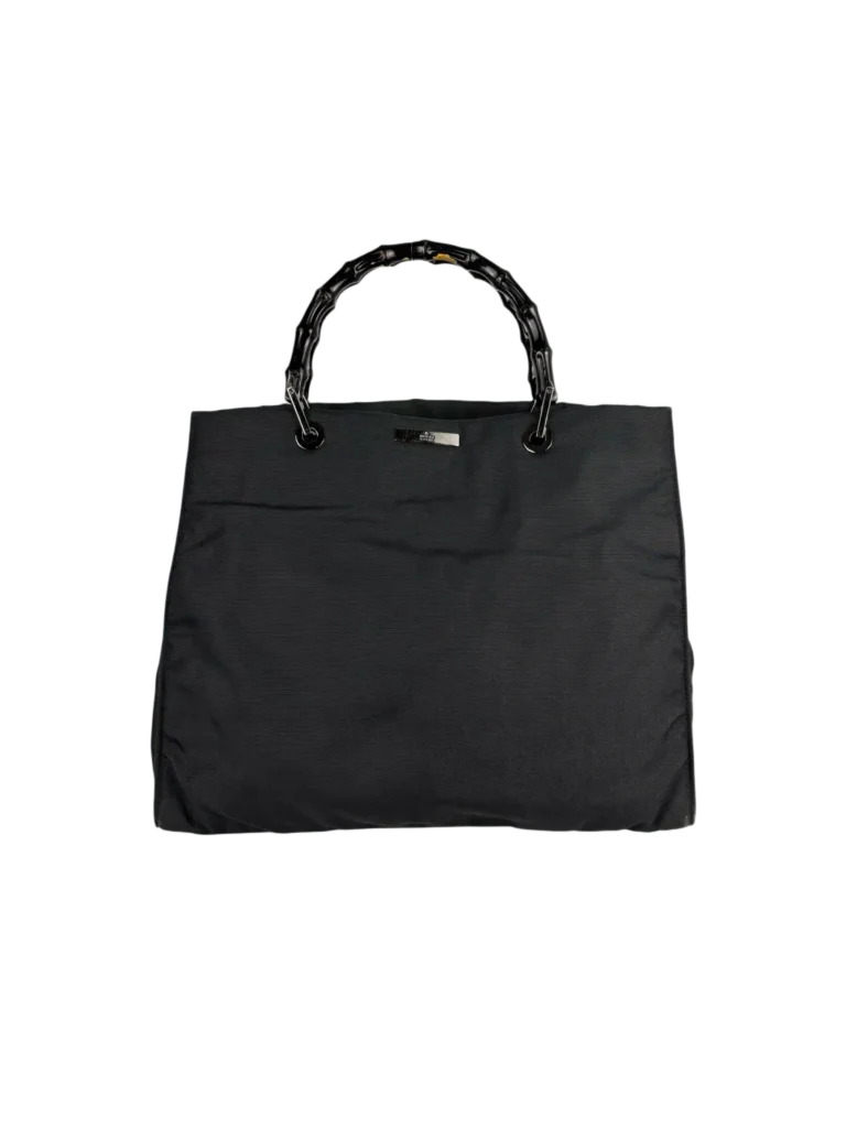 Borsa a mano in nylon con manici in bamboo.
