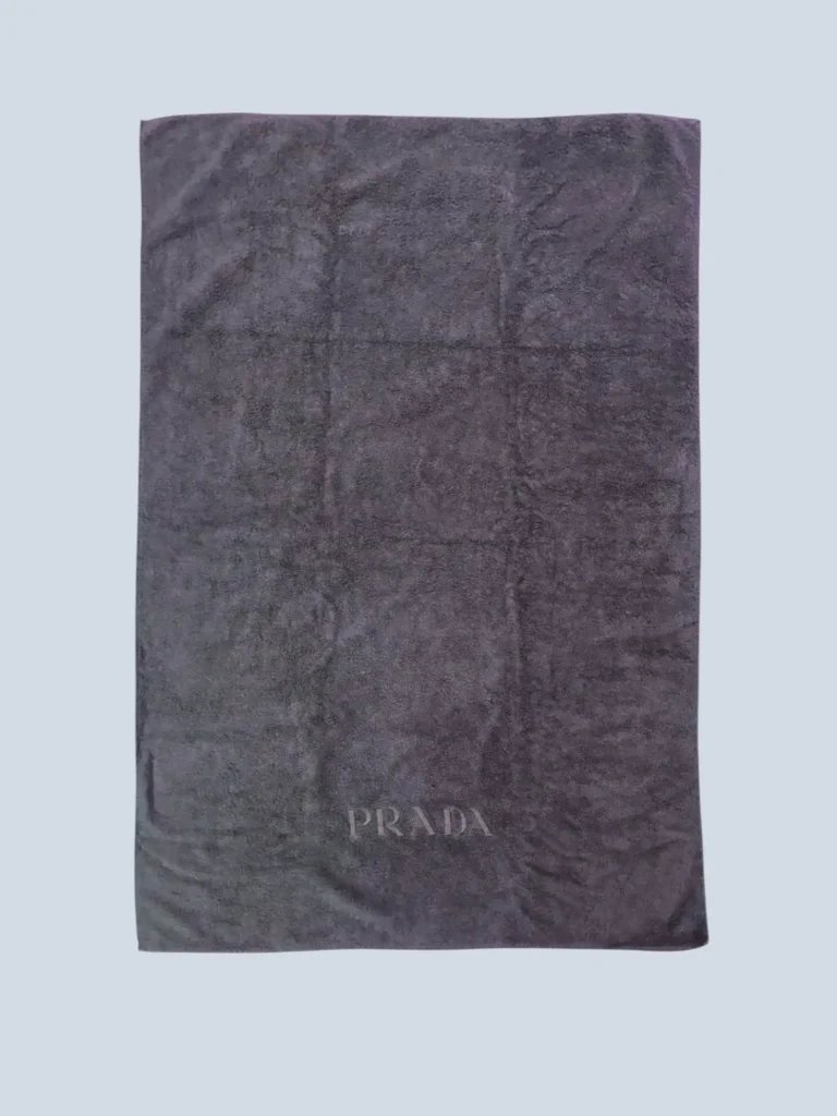 Terry cloth beach towel with logo.