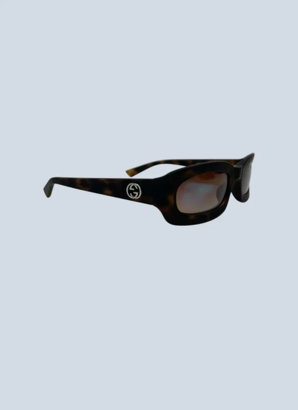 <b>Gucci</b><br> occhiali da sole in acetato opaco havana.