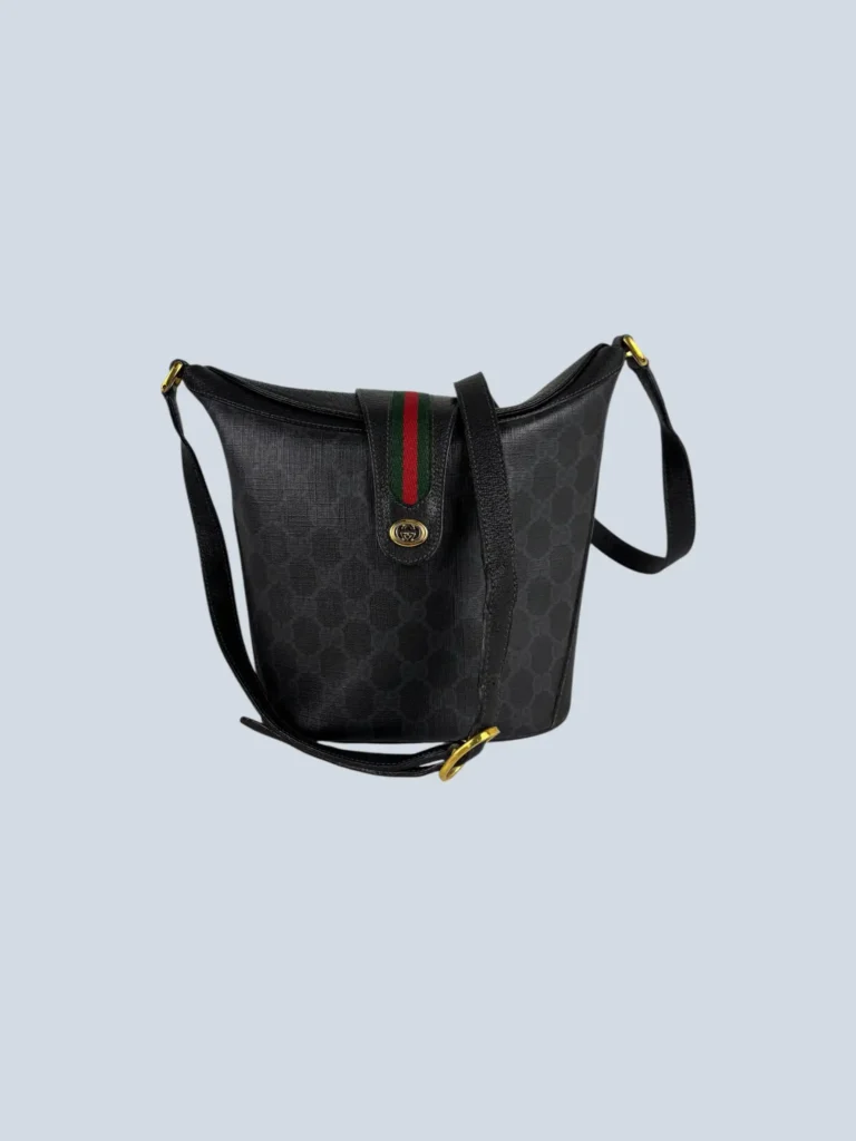 Monogram coated canvas crossbody bag.
