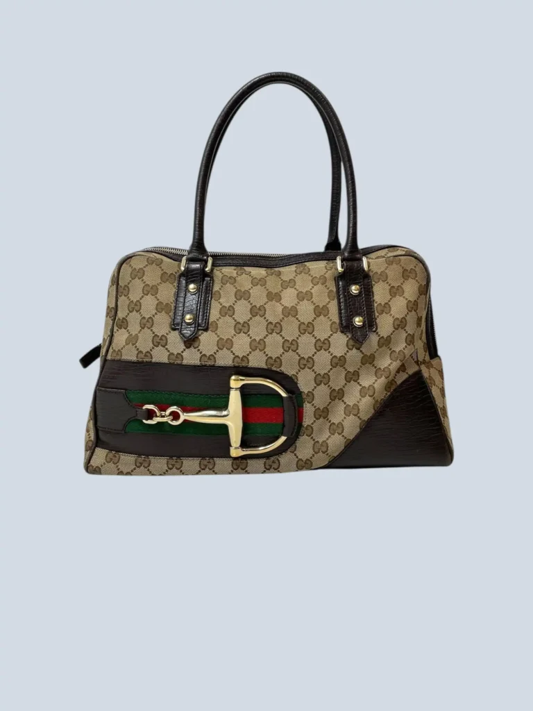 Hasler Horsebit Monogram canvas and leather shoulder bag.