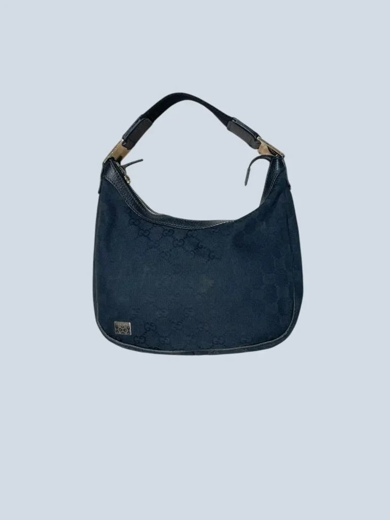 Borsa a mano in tela Monogram e pelle.