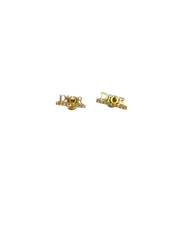 DioRevolution metal and rhinestone earrings.
