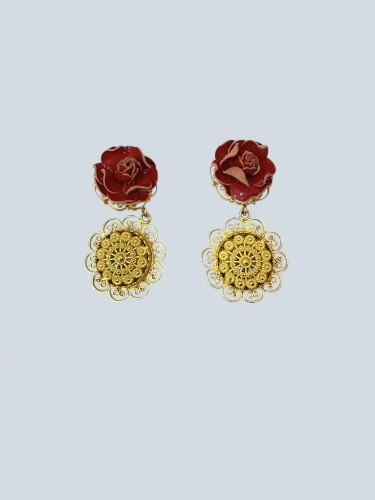 Brass clip-on earrings with leather rose.