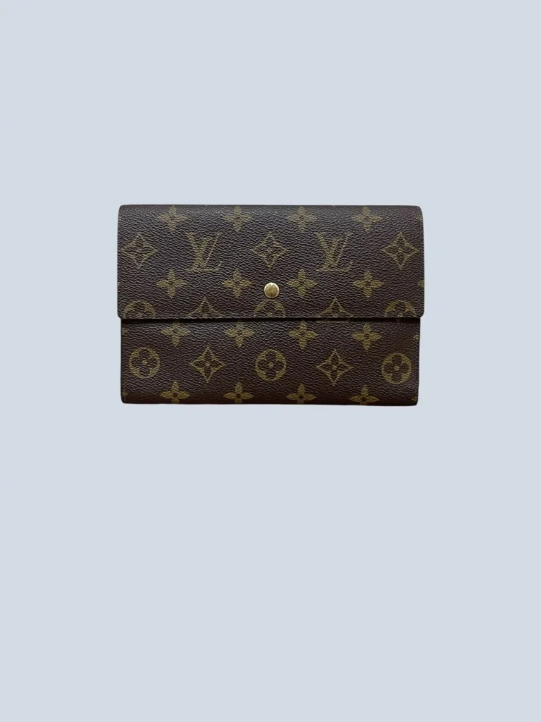 Portafoglio maxi vintage in tela Monogram e pelle.