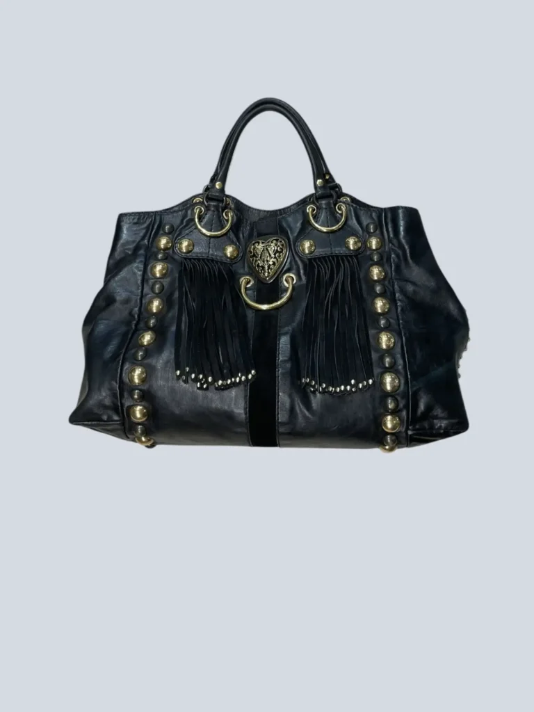 Borsa tote Babouska Hysteria in pelle con frangie e borchie.