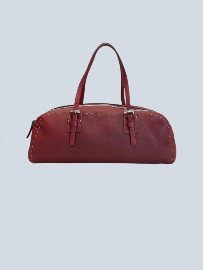 Borsa a mano Selleria in pelle con impunture a vista.