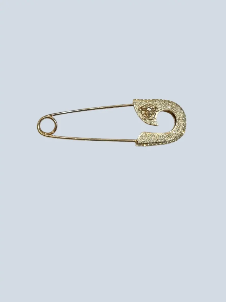 Spilla Safety Pin in metallo e cristalli.
