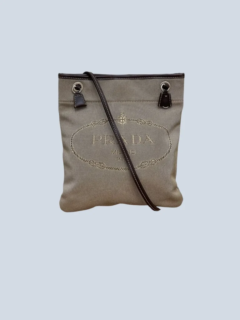 Prada, borsa a tracolla in tela Canapa e pelle con logo jacquard.
