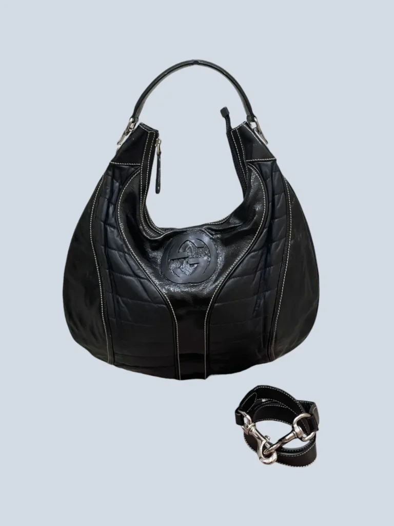 Snow Glam Hobo shoulder bag in patent leather and leather.