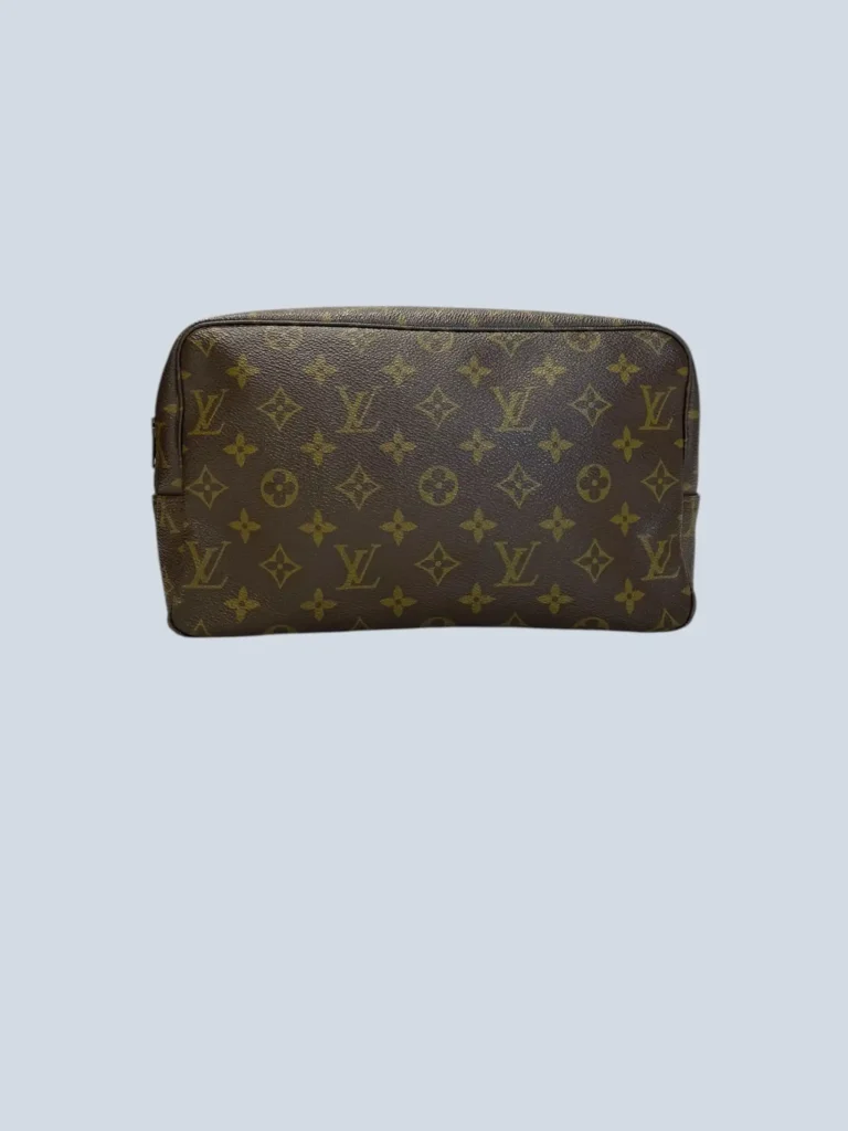 Pochette Trousse Toilette 28 in tela Monogram e pelle.