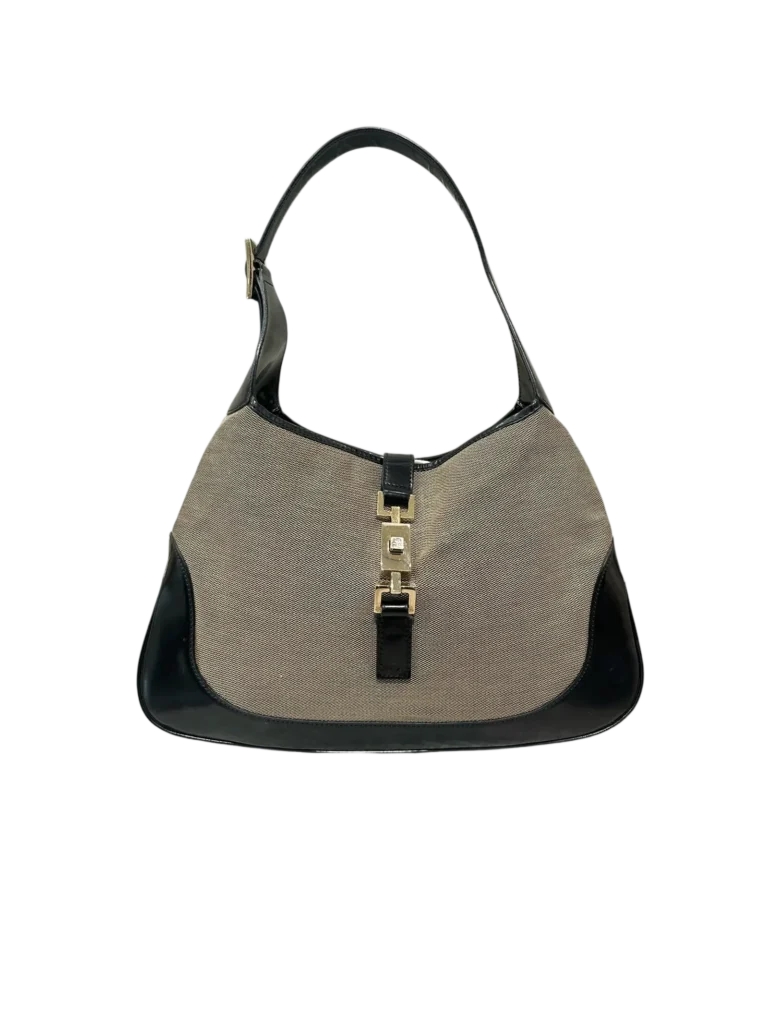 Borsa a spalla Gucci Jackie Media fronte con fibbia in tela e pelle.